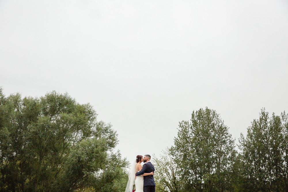 natural wedding portrait outside of mill venue derby