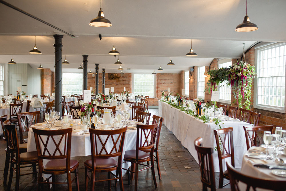 wedding breakfast room at west mill wedding venue